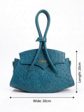 The Elythra in Teal — Ostrich-Embossed Leather